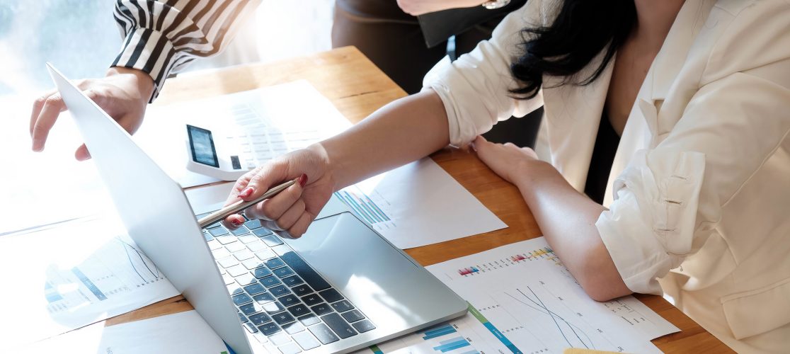 financial advisory services. Group of business advisor showing plan of investment to clients in the consultancy office